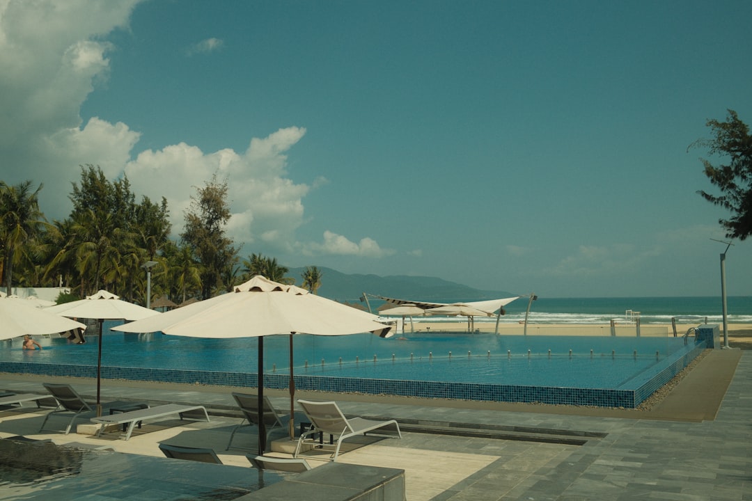 Infinity pool overlooking the ocean at a tropical resort