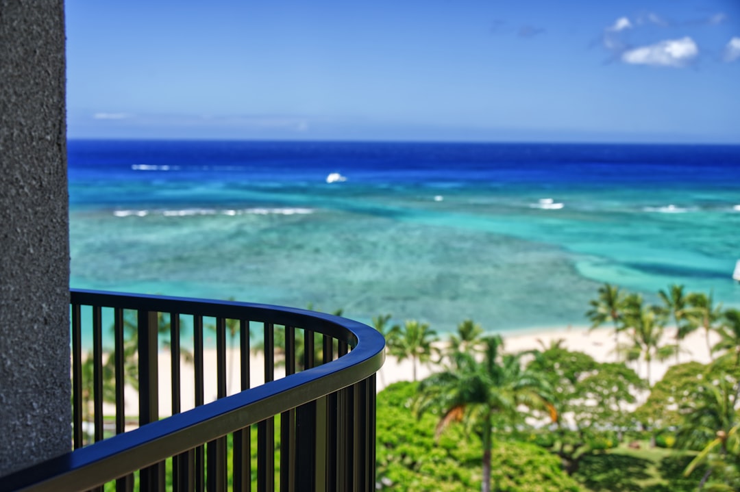 Bright luxury suite with an ocean-view balcony